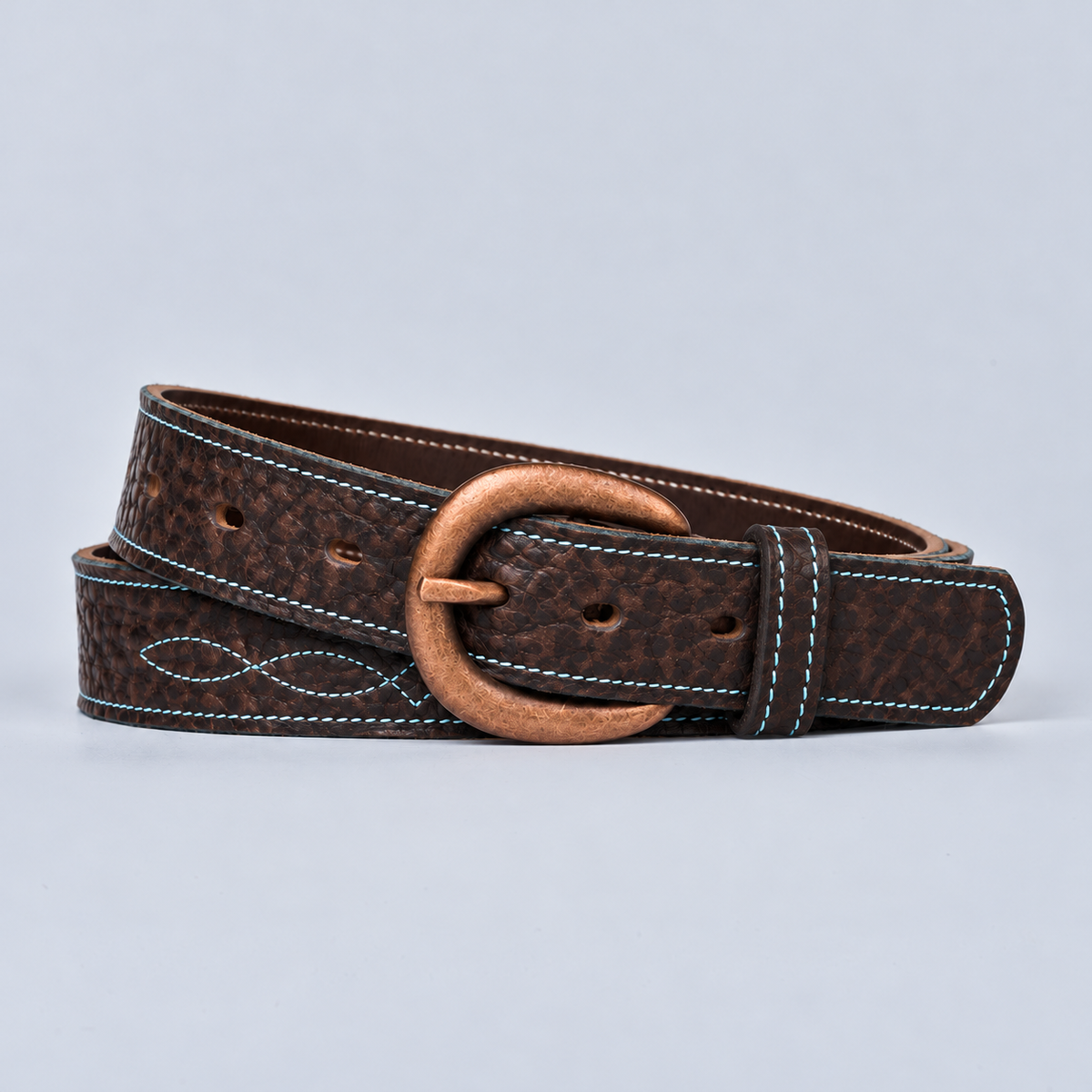 The Yellowstone for Women 1″ with Stitched Center western belt in brown bison leather with teal stitching and copper buckle.