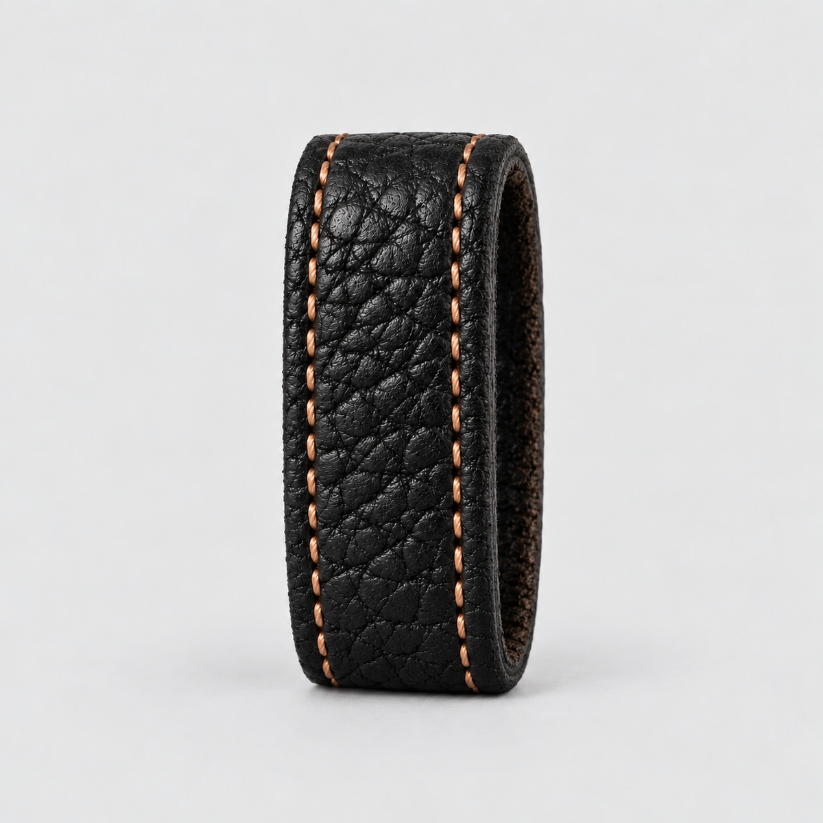 Black shrunken bison 1.5″ Shrunken Bison #22 Keeper belt loop with contrast stitching for a 1.5″ belt.